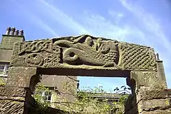 Romanesque lintel circa 1120, showing St Michael fighting a dragon