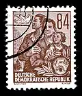 "5-year Plan" postage stamp series, 1953: A family standing before a high-rise near the Weberwiese subway station