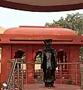 Statue of Dashrath Manjhi in front of his memorial at Gehlaur