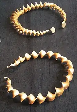 The twisted ribbon type, here from the Stirling Hoard, is found in both Bronze and Iron Ages.