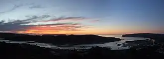 Photograph of sunset over harbour