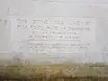 Inscription recording the laying of a foundation stone in 1922
