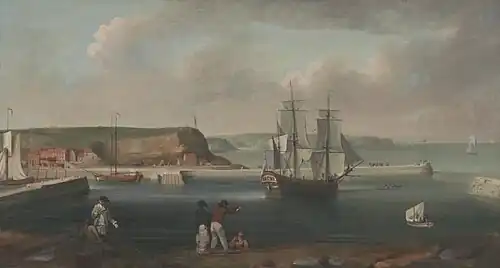 A three-masted sailing ship leaves a busy seaport while five men watch from the shore. Green hills flank the seaport, beneath a cloudy sky.