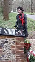 A visitor to the memorial