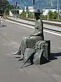 Lady waiting at the train station