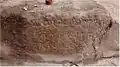 Inscriptions on a mountain in Thuvarankurichi