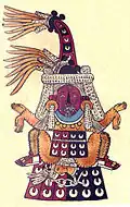 Page 13 of the Codex Borbonicus with Tlazolteotl, who is portrayed wearing a flayed skin, giving birth to Cinteotl