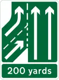 Additional traffic lane joining from the left in 200&nbsp;yd (180&nbsp;m). Traffic on the main carriageway had priority over joining traffic from the right-hand lane of the slip road (primary routes)