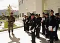 A Greek special forces representative from the NMIOTC speaks with students from the Willard High School, as part of an annual program that allows the students to get an up-close look at the various branches of the U.S. armed forces.
