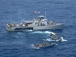 BRP Dionisio Ojeda (PG-117) with two rigid hull inflatable boats operated by the members of U.S. Joint Special Operations Task Force–Philippines (JSOTF-P)