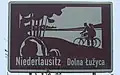 Bilingual information board on the A13