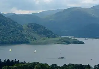 A lake surrounded by mountains