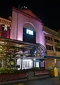 View of Uptown at night on Queen Street Mall
