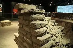 Urban standard details; Mexico-Tenochtitlan's Calmecac stone wall remnants in Centro Cultural de España archaeological site (Mexico City)