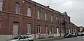 Former combined town hall and school