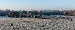 Elevated view of the ruins of Waverley Abbey in a frozen rural landscape