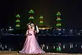 A couple on their photo session in Western wedding attire