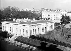 The expanded West Wing, c. 1910s, after President Taft's 1909 expansion covered most of the tennis court. Note the "bow" of the first Oval Office.