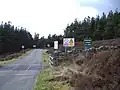 Entrance to the Otterburn Ranges near Holystone - note the cattle grid