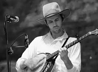 Playing five-string banjo Ossipee Valley Music Festival in Hiram, Maine July 25, 2014.