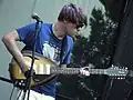 Jarvis Taveniere on twelve-string electric guitar