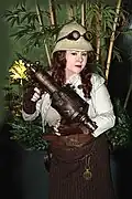 Image 102Woman wearing Neo-Victorian steampunk costume, including goggles and pith helmet, 2010. (from 2010s in fashion)