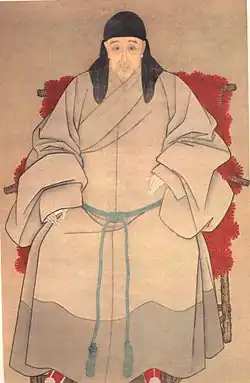 A scholar-bureaucrat in casual dress.
