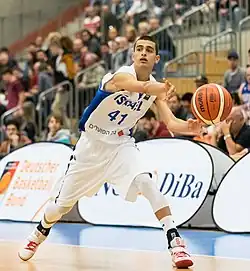 Image 20Israeli basketball player Yam Madar making a blind pass. (from Basketball moves)