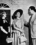 Pictured from left: Elspeth Eric (Lucia Standish), Barbara Weeks (Anne Malone), Sandy Becker (Dr. Jerry Malone). When the Malones move from Three Oaks to New York City, Lucia offers to sell them a home at a bargain price because she has designs on Jerry.