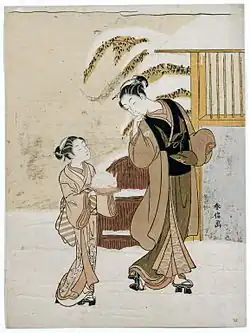 Young Woman Admiring a Snow Rabbit