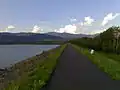 Dyke of the Zemplínska Šírava reservoir on the outskirts of Jovsa, with footpath