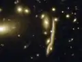 Gravitational lenses found in the DESI Legacy Survey data[54]