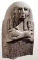 Lid of the mummiform sarcophagus of Aset, singer of Amun and wife of Djehutymes. Pink granite, with traces of painting. Museo Egizio, Turin.